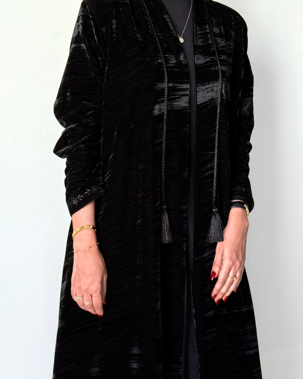 Crushed velvet fabric with embroidery in sleeves