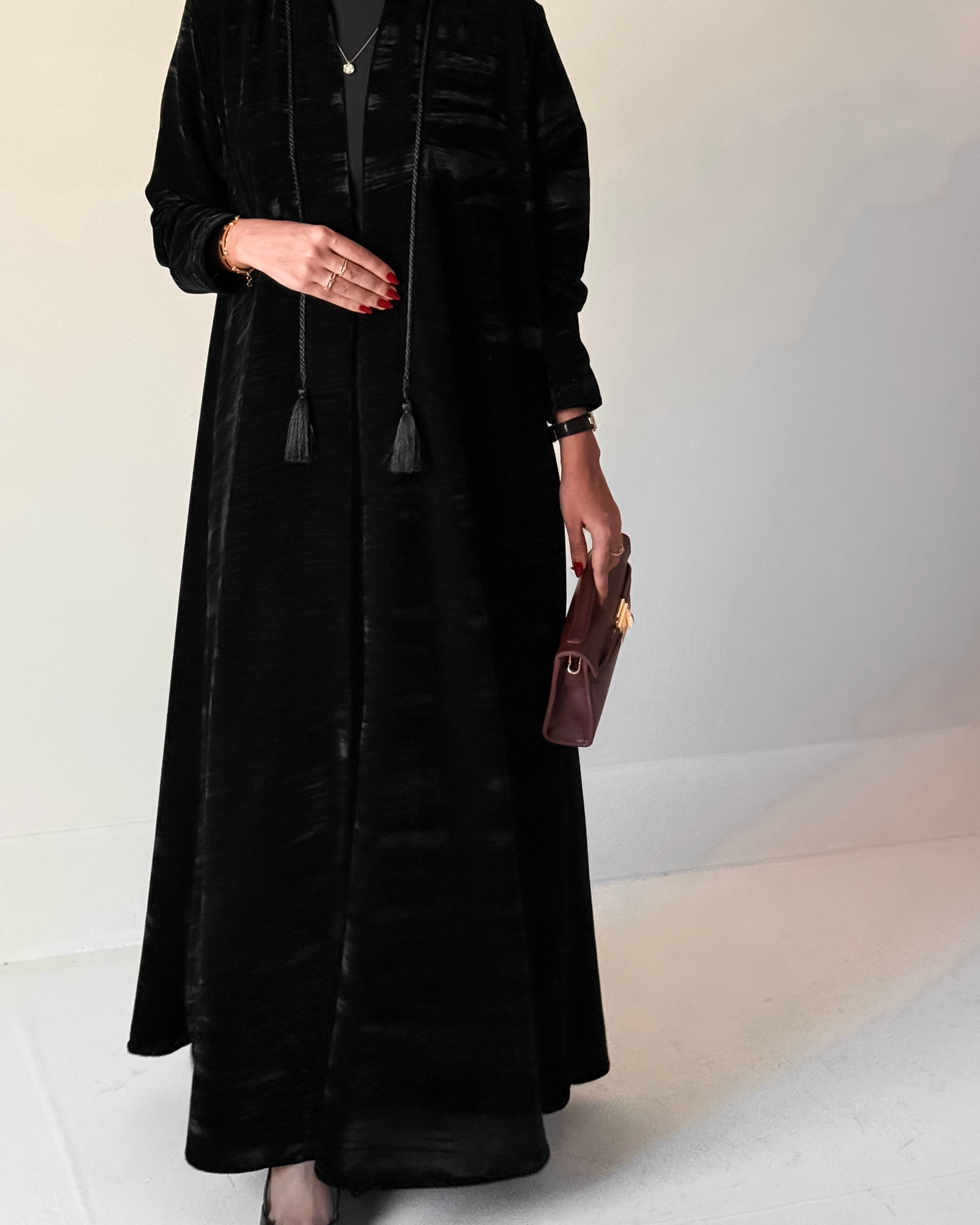 Crushed velvet fabric with embroidery in sleeves