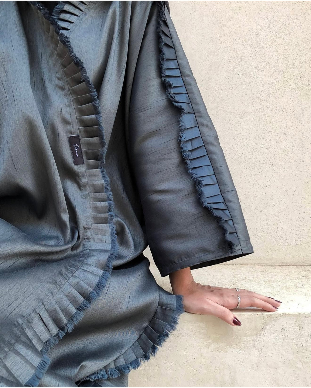 Raffles edges silk abaya in charcoal