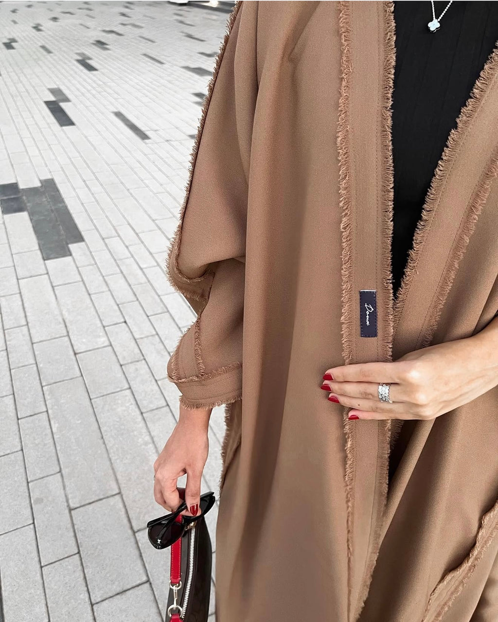 Pre fall crep abaya with raw edges in Burnt almond
