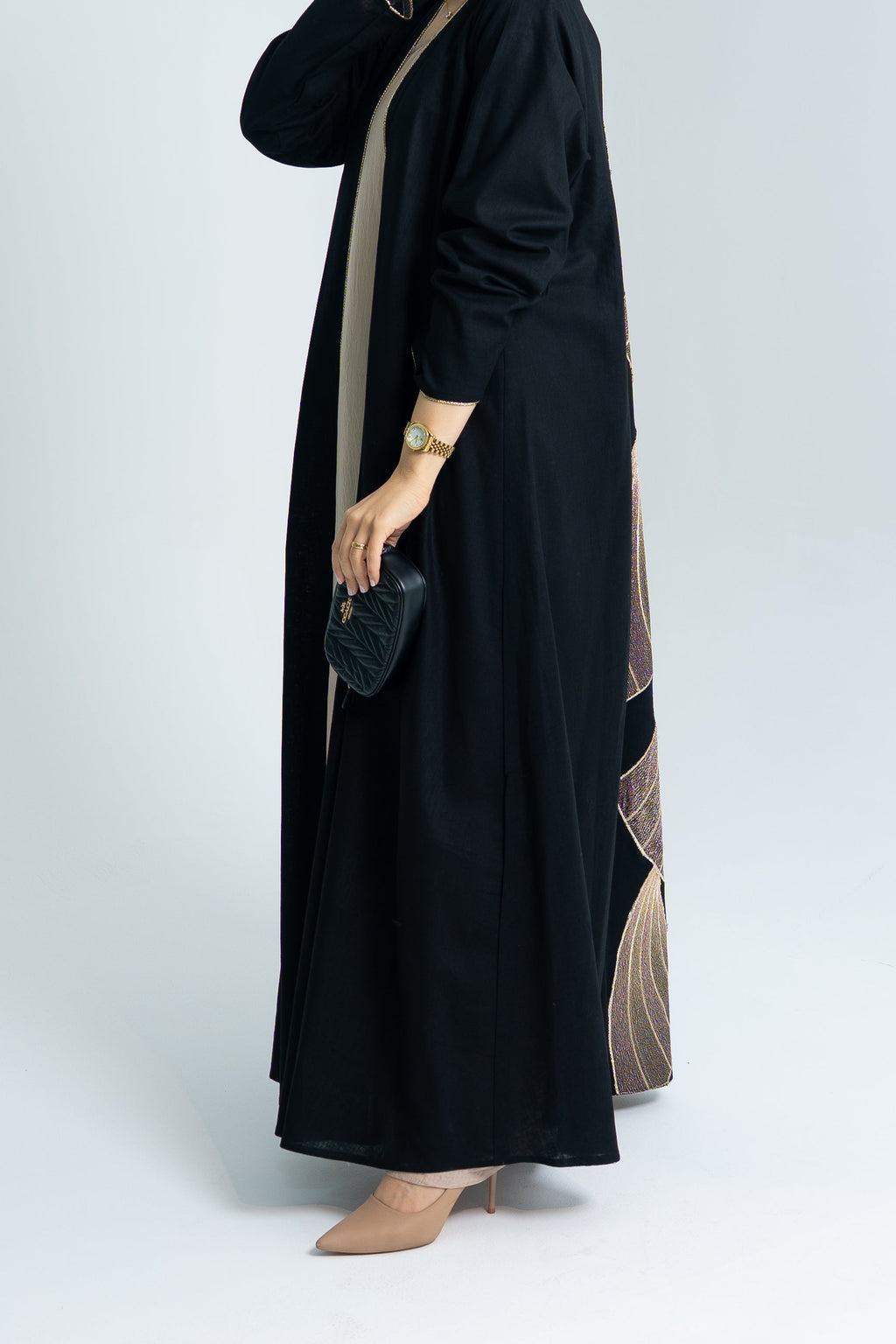 A cut Linen abaya with gold embroidery