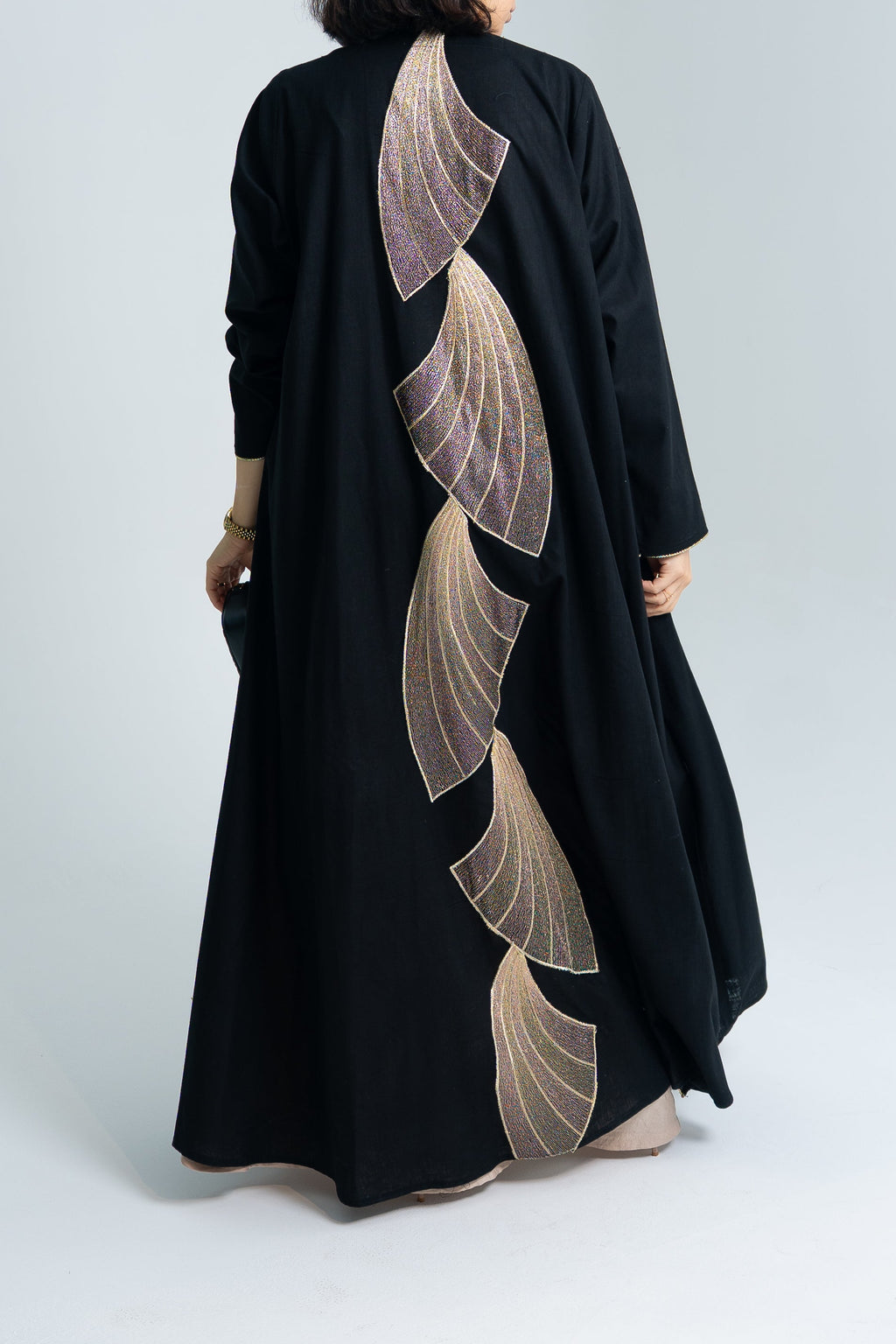 A cut Linen abaya with gold embroidery