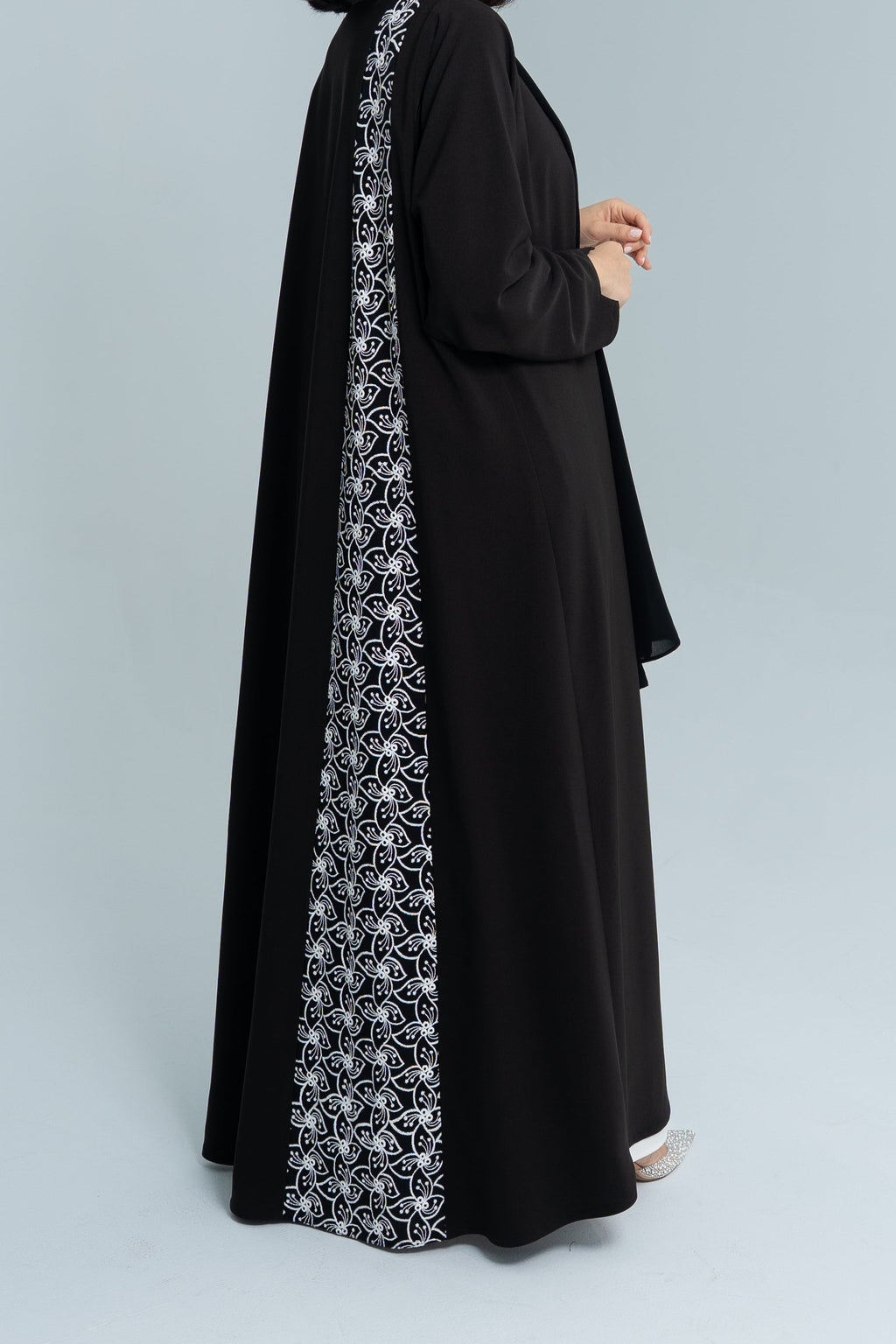 A cut abaya in Korean crepe with floral fabric