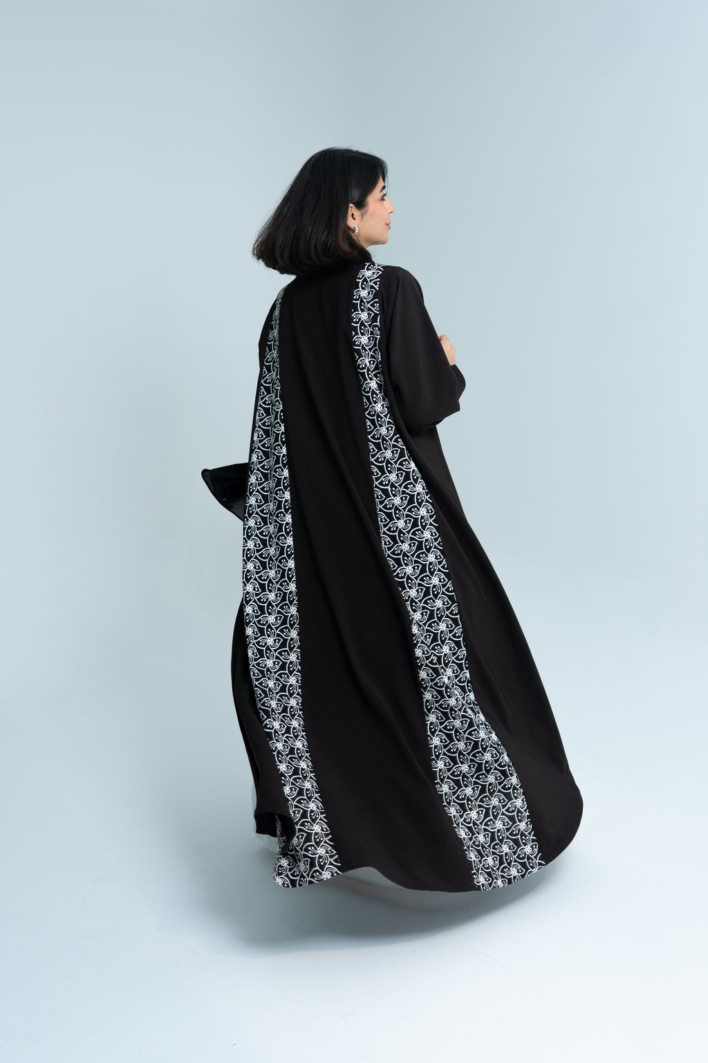 A cut abaya in Korean crepe with floral fabric