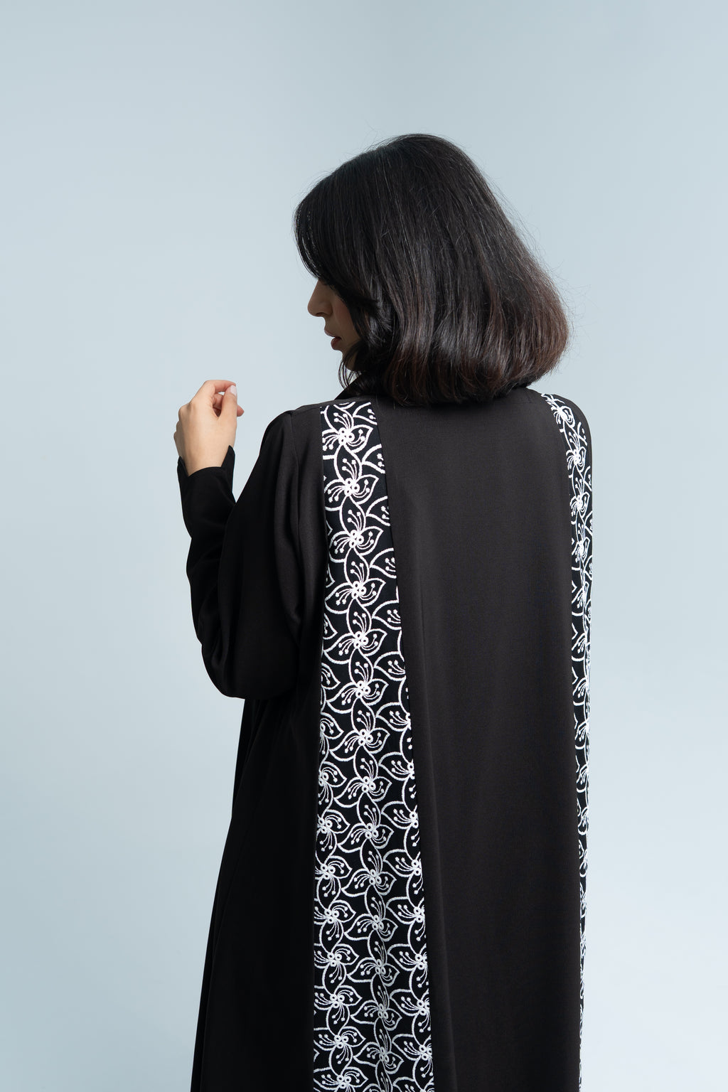 A cut abaya in Korean crepe with floral fabric