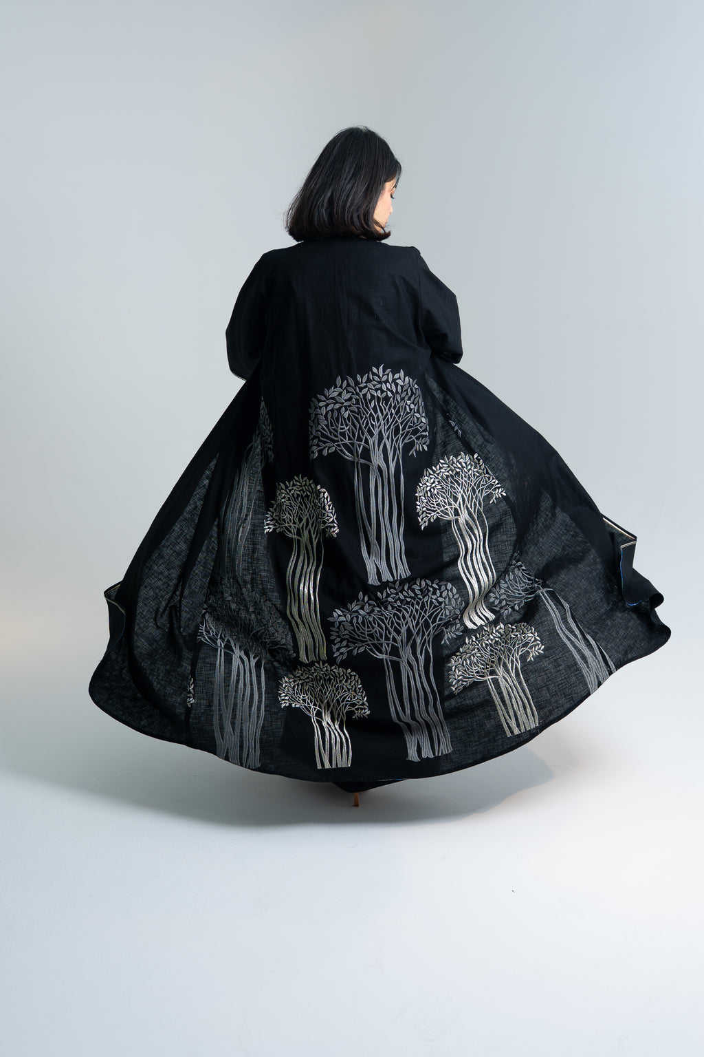 A cut Linen abaya with hand embroidery